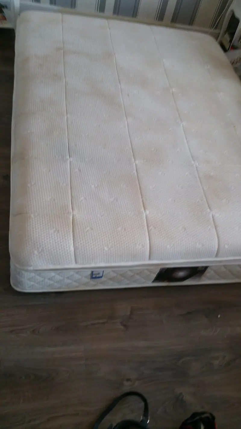 Mattress with marks and staining before cleaning