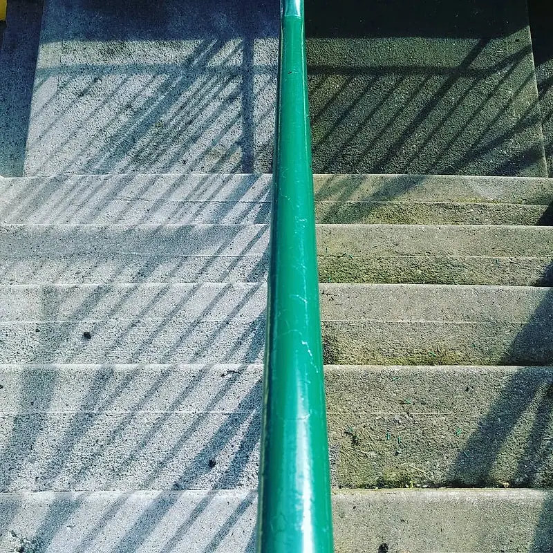 The same concrete steps after cleaning, pale and clean